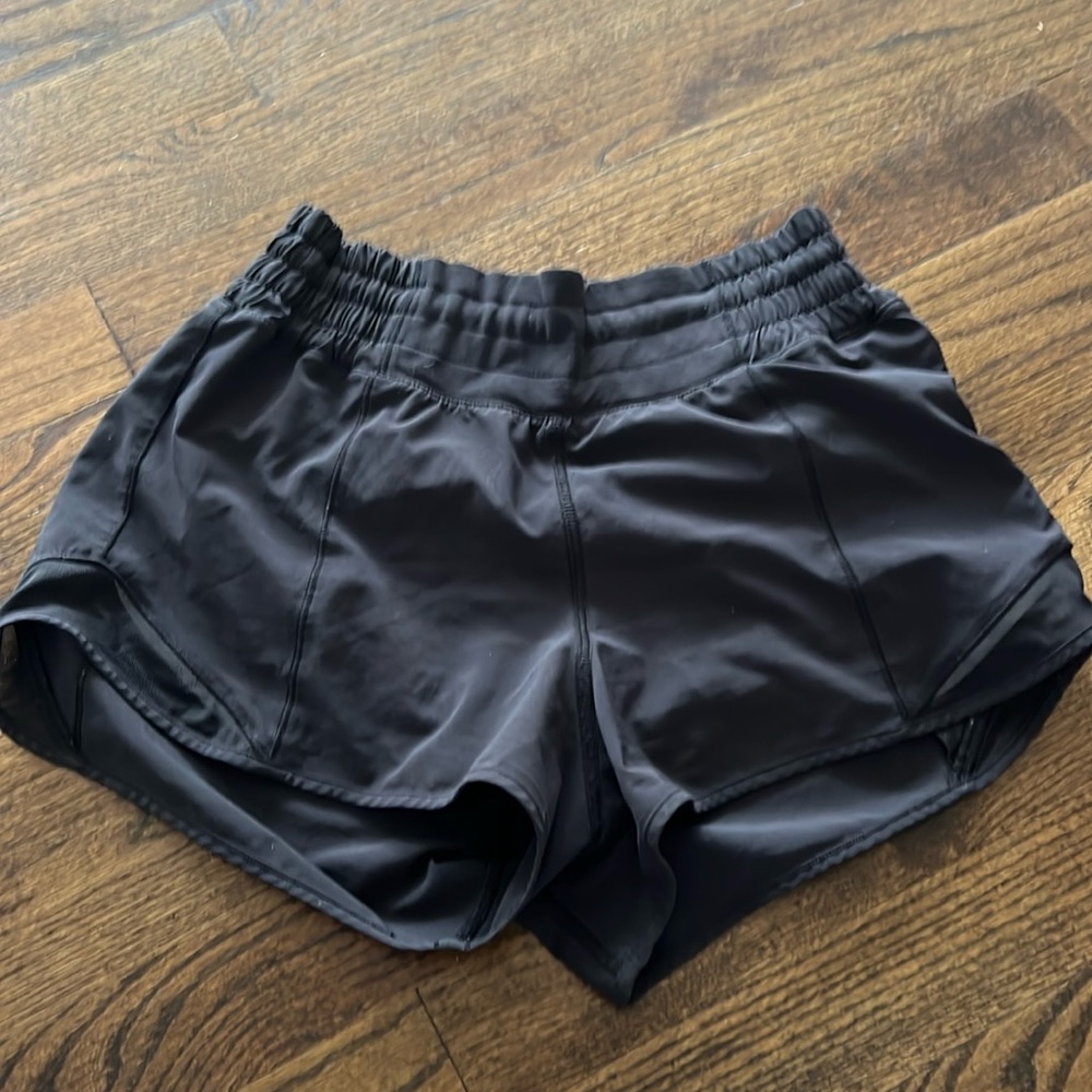 Black Hotty Hot Lulu shorts. High Rise.Size 2. Great condition.No tears or rips.